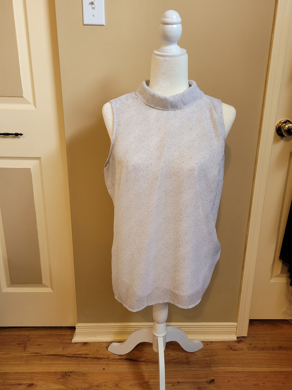 cleo Sleeveless Mock Neck Camisole.